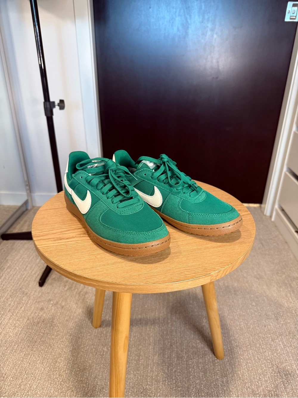 Nike Green Low-Top Sneakers with White Swoosh and Gum Sole